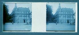 [Woman and child in front of building]