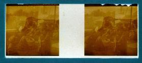 [Double exposure; three women seated / water and cliffs]
