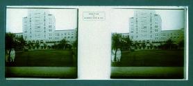 [Two unid. women in front of hotel]