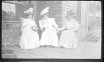 Marie Willard, May Gifford and Josephine Dickman on porch, Oak Lodge Trip