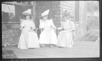 Marie Willard, May Gifford and Josephine Dickman on porch, Oak Lodge Trip