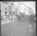 Decorated horse and carriage on city street
