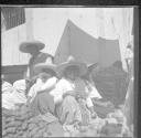Children selling goods at public market