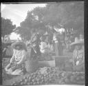 People selling goods at public market