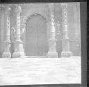 Arched doorway with ornate doors
