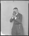 Capt. Sterling looking through motion picture camera