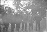 [Group of Schriners wearing fezs]