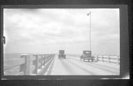 [Automobiles on causeway]