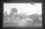 [View of hotel grounds & lake]