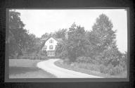 [View of large house, yard, & driveway]