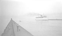 [View of pier & passenger boat]