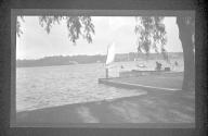 [Sailboat & powerboat on lake]