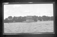 [Open air building on small island]
