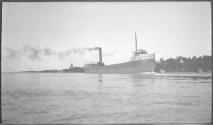 [Large ship on river]