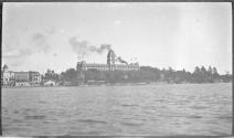 [Large building along river]