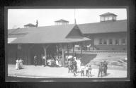 [Group of people at rail station]