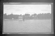 [View of shore from river]