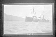 [Large ship on river]