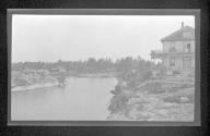 [House on small rocky inlet]