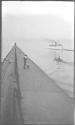 [View of pier & passenger boat]