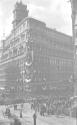[Powers building & crowd watching parade]