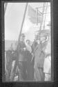 [Man with sextant on passenger ship]