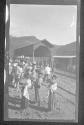 [Native peddlers along r ailroad tracks]