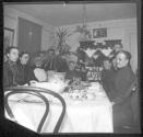 [Group of people at table]