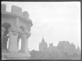 [Tower with large chateau in distance]