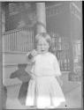 [Small child on porch steps]