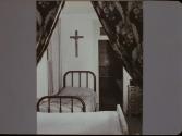 Bedroom with crucifix