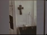 Crucifix over sink - St. Joseph's House