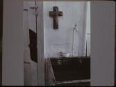 Crucifix over sink - St. Joseph's House