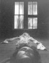 [Woman Looking through Window]