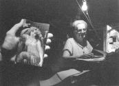 [Older Woman Under Light Bulb]