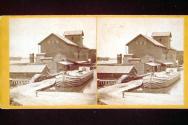 [Barge docked at Warehouse]