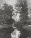 [River landscape, cathedral in distance]