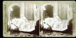 [Man and woman in bed]