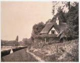 [River scene with cottage]