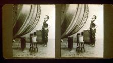 [Wallace Clendenen by film drying wheel at Famous Player Lasky Photo Lab]