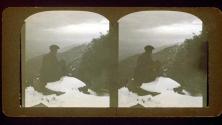 [Will Connell, in mountains seated on snow-covered rock, California]