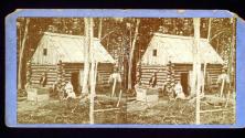 [Family with log cabin]