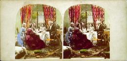 [People sitting at table eating]
