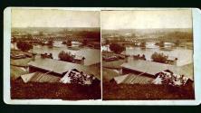 [View of rooftops and bridge]