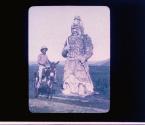 Marble Mandarin: China (One of the marble figures on road near Ming Tombs. Guide Chin on donkey.)