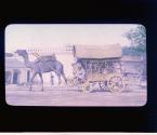 The Camel-Cart of India (This is a two-story runabout. The women occupy the first and the men the second. Either place was cramped and extremely uncomfortable in the heat and dust of the thirty mile drive d just finished) [7a]