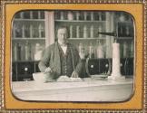 [Apothecary, interior view with chemist at work]