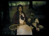 [Katherine (Kitty) Stieglitz with tennis racquet]