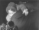 [Sleeping Child in Mother's Arms]