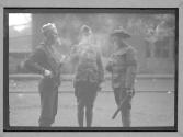 [Soldiers Smoking in Street]